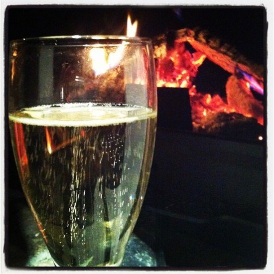 Champagne and a log fire - good enough for Mrs O