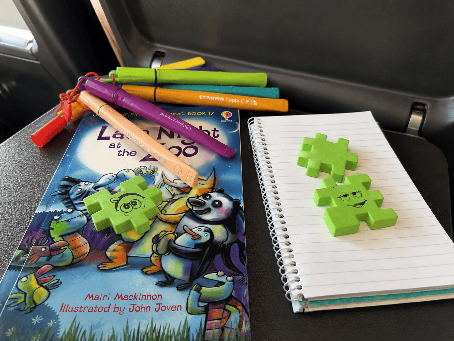 activities for 5 7 year olds on planes restaurants books happy cube notepad